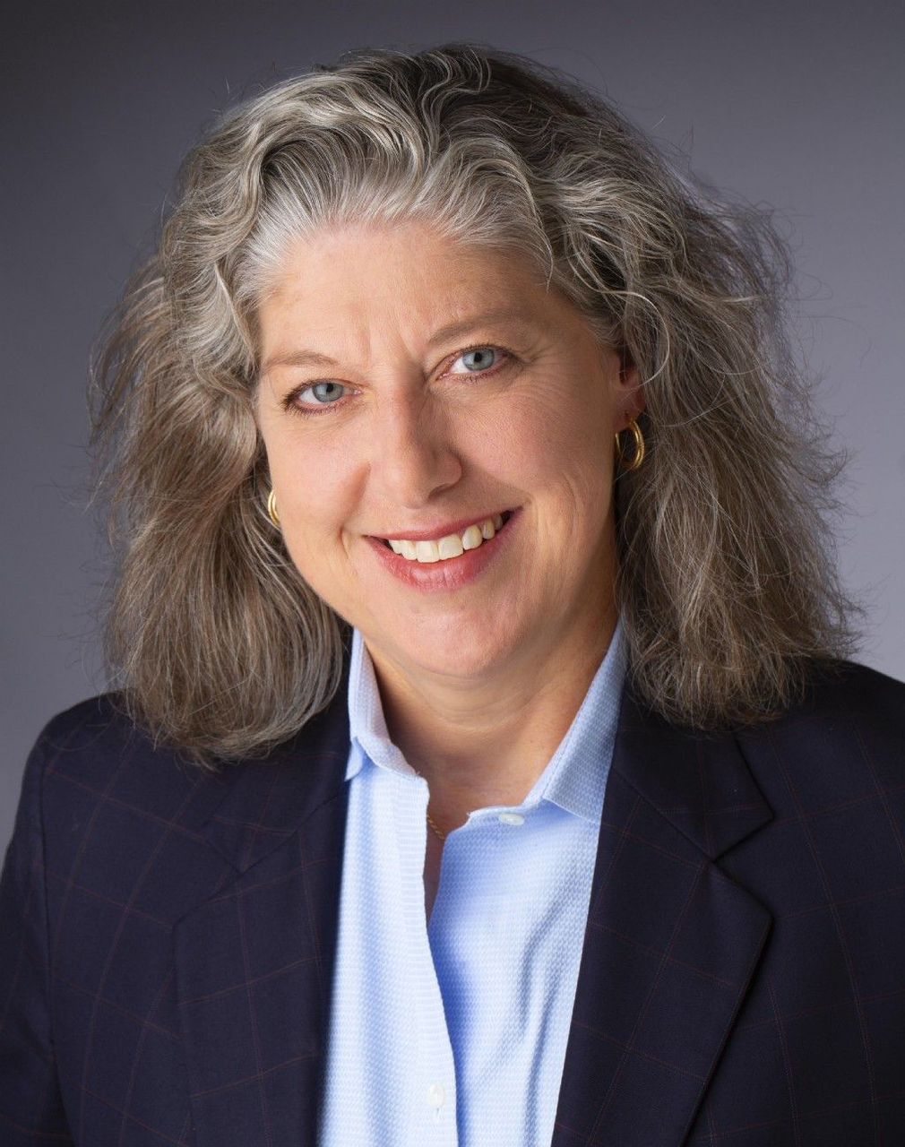 Dr. Claudia Merz — Chief Operating Officer